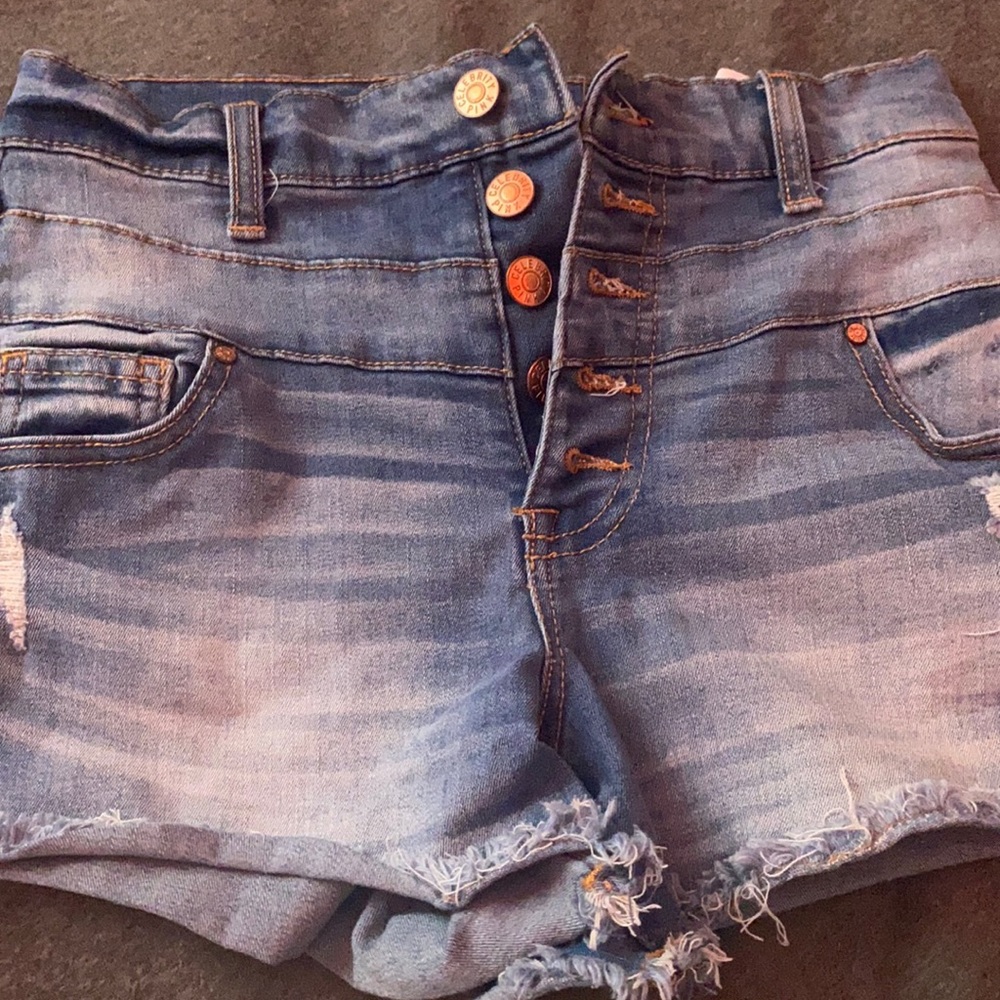 I’m selling these Jean shorts that are denim blue